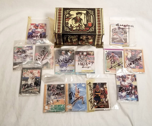 USED:  Tin collectible case W/ Sports cards