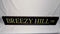 USED: Metal Street Sign "BREEZY HILL DR"