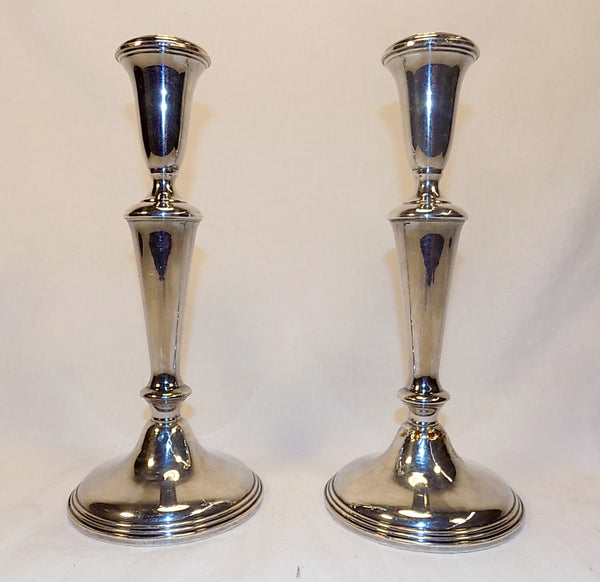 Pair Of Vintage Empire Silver clad weighted candle holders