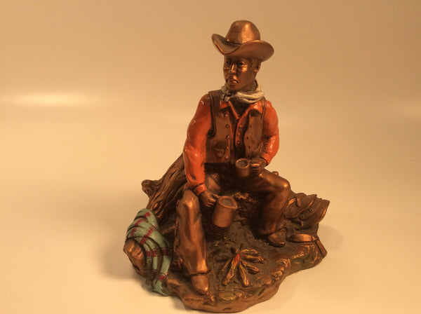 universal statuary corp. cowboy with coffee