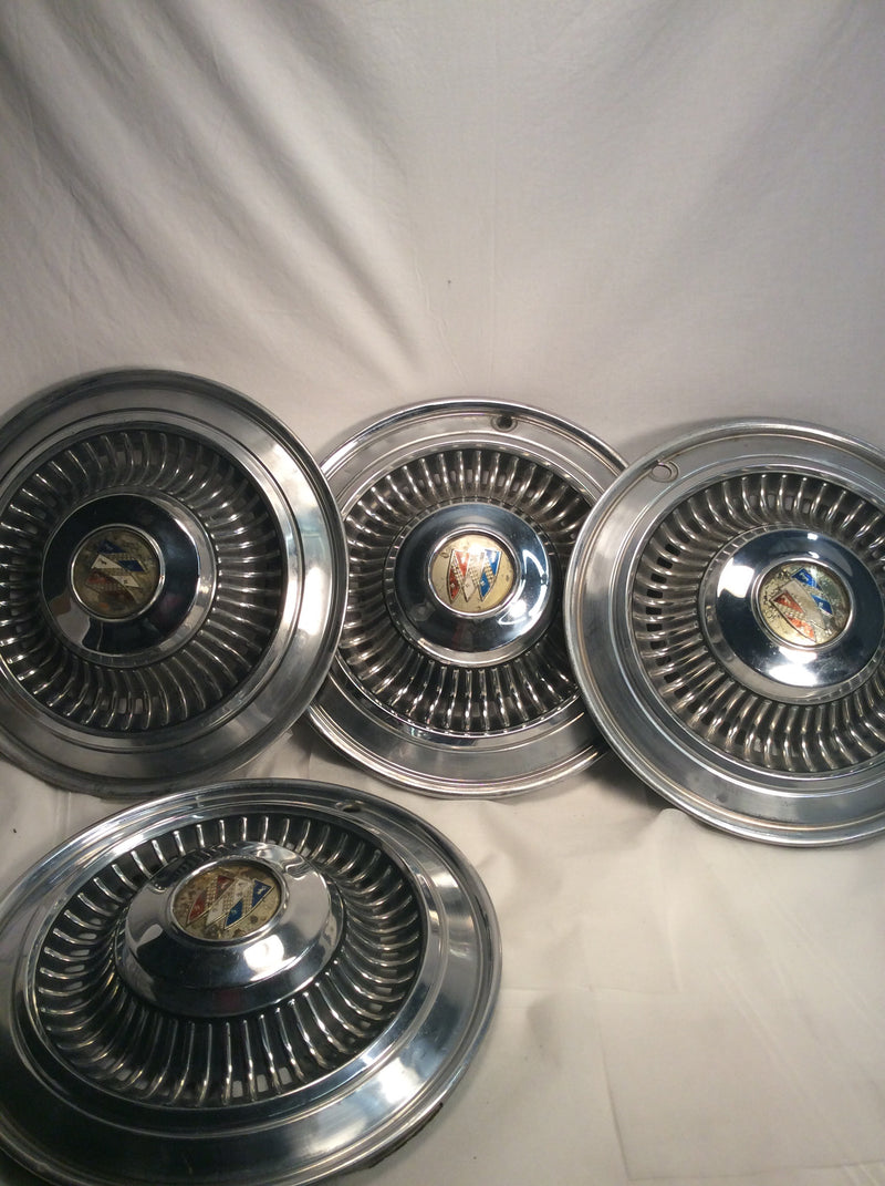 Vintage Buick hubcaps (4)